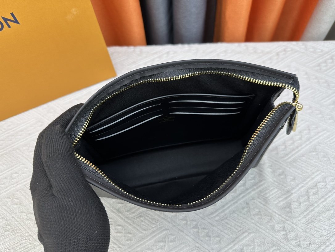 Louis Vuitton Pochette Voyage Monogram Heart Clutch — front