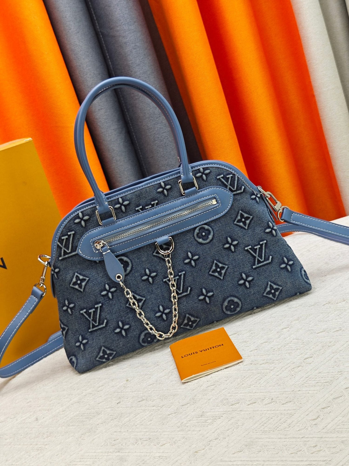 Louis Vuitton Ever More Blue Monogram Handbag — hero