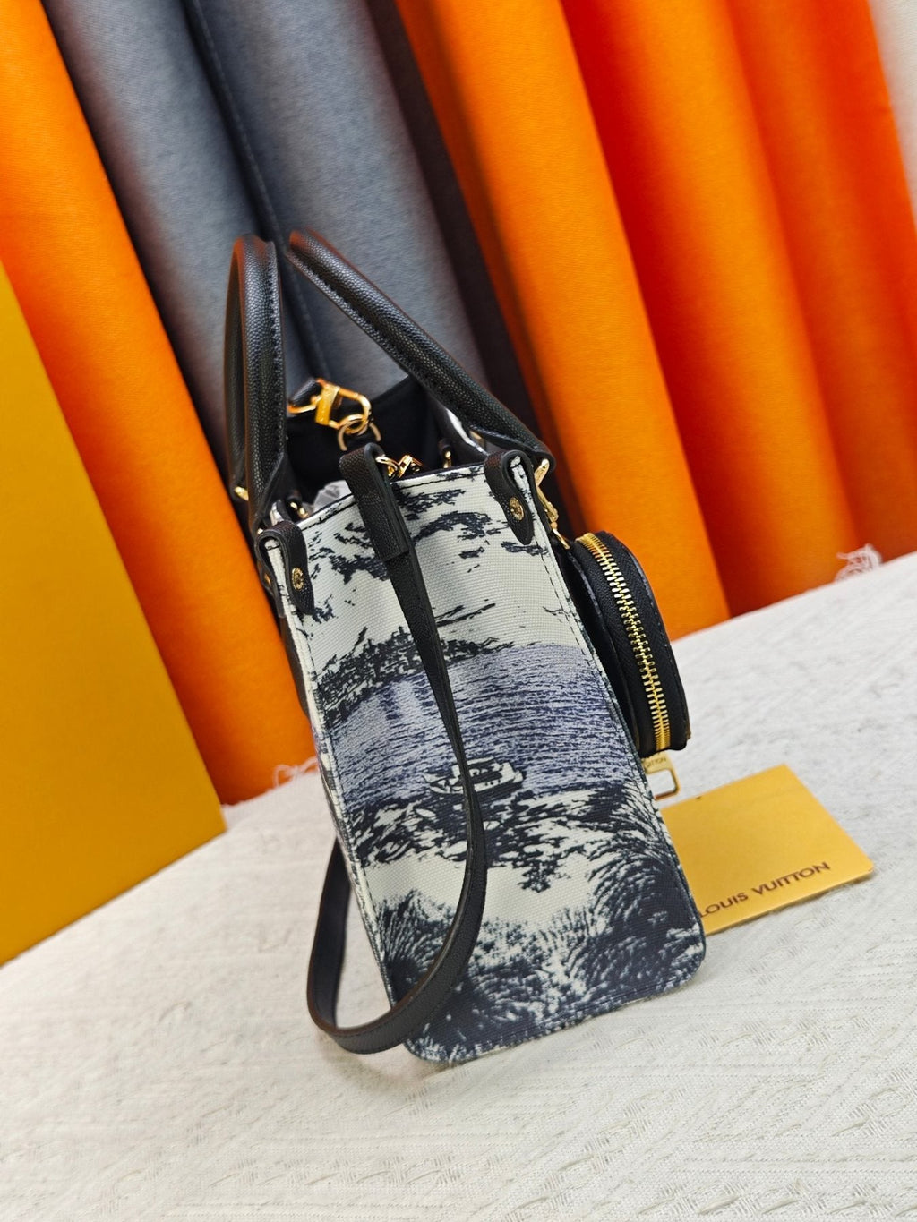 Louis Vuitton OnTheGo Patterned Tote with Round Pouch — side