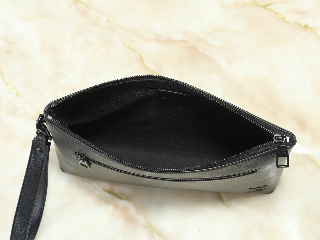 Louis Vuitton Takeoff Leather Wristlet Clutch — detail