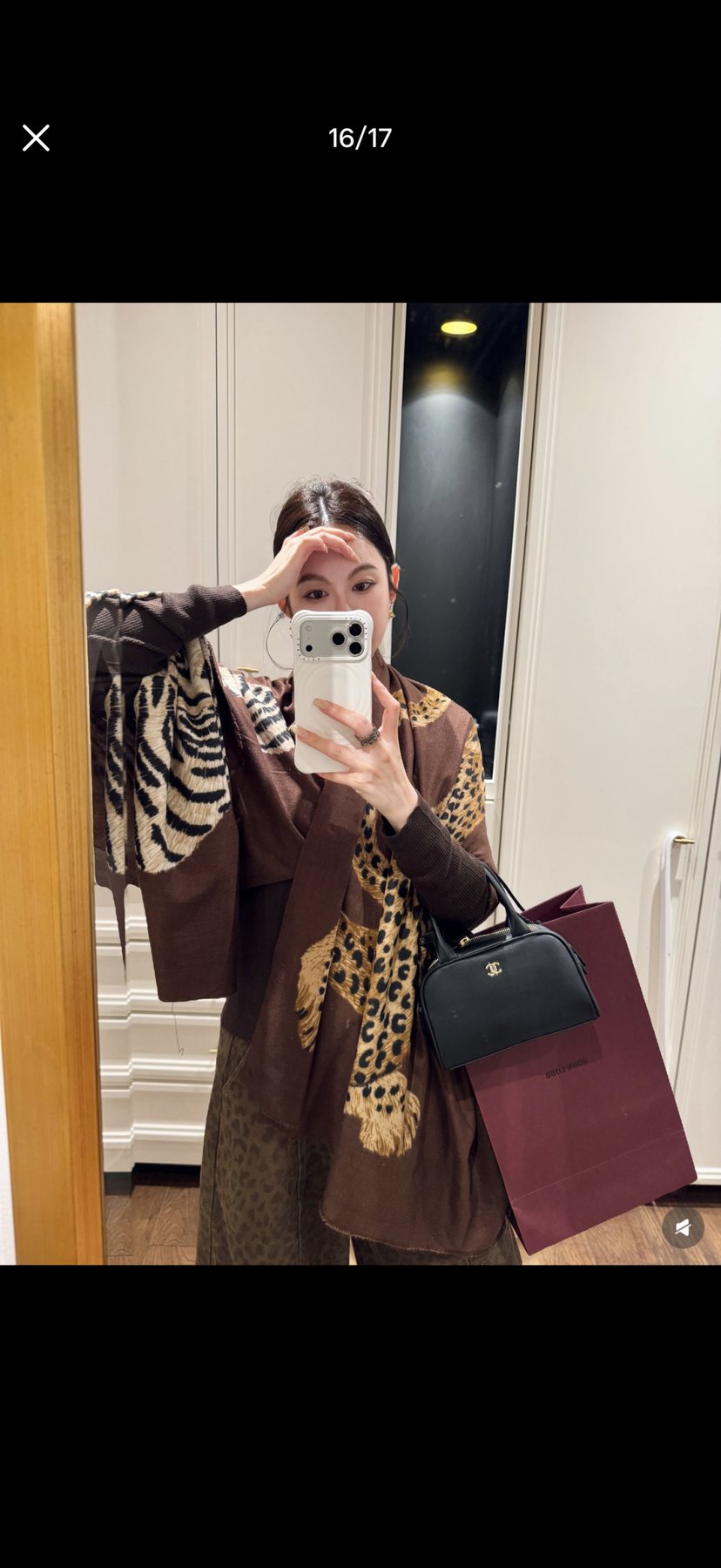 Chanel Black Bowling Bag with Round Charm — model