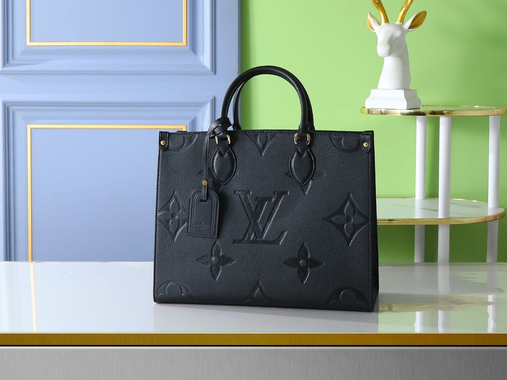 Louis Vuitton Onthego Monogram Empreinte Tote — hero